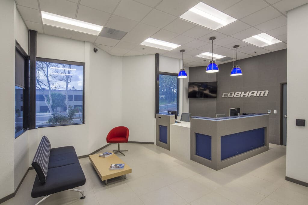 A reception area with blue and white walls.