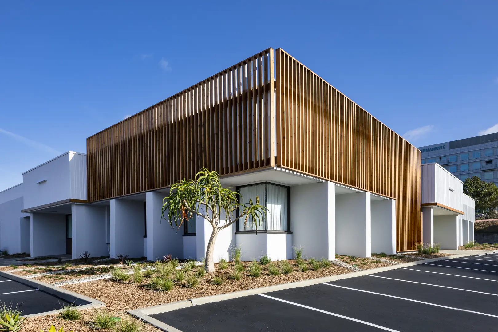 A building with wood paneling on the side of it.